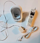 Uniden Model EXI4246 Phone And Base Unit. White, Good Working Condition.. Fixed Price $7.00.